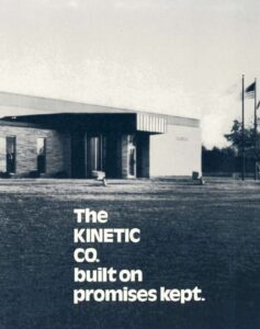 kinetic co building on black and white page with tagline